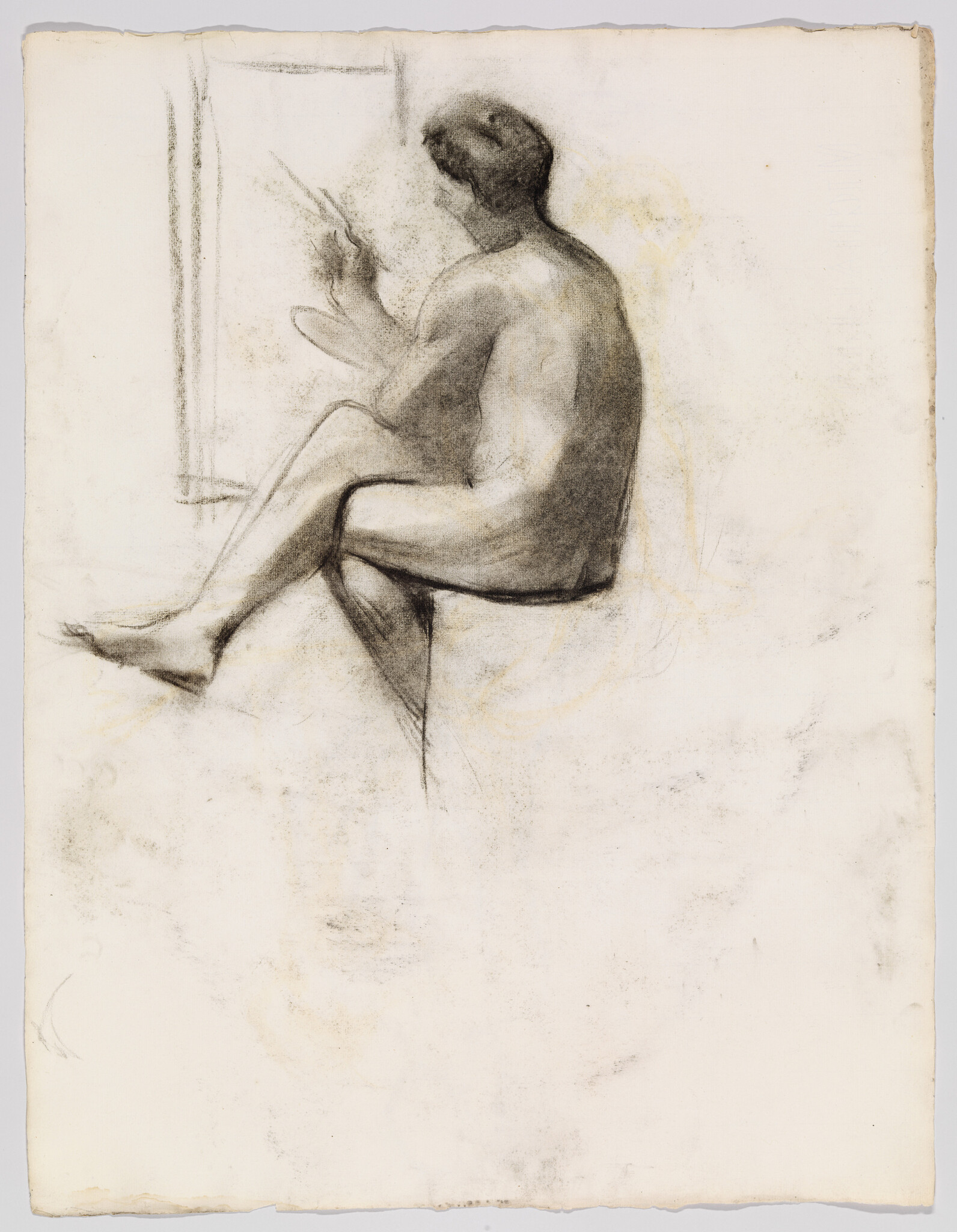 Nude seated man sketched in charcoal, turned away, holding a painter's palette and brushes.