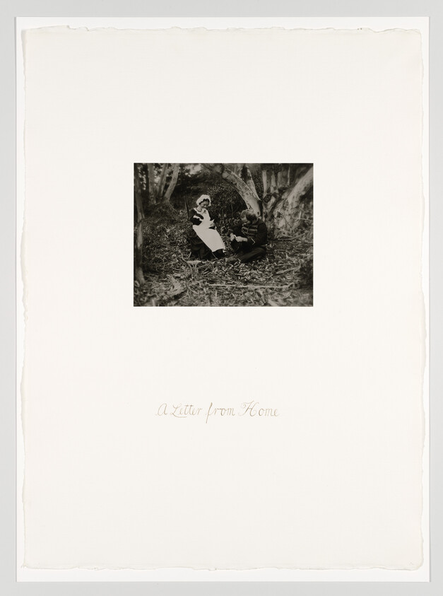 A woman in a white apron reads a letter to a seated man in a wooded clearing.