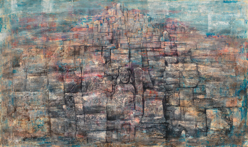 Faded stone carving of a seated Buddha embedded in layered temple stones and weathered textures.