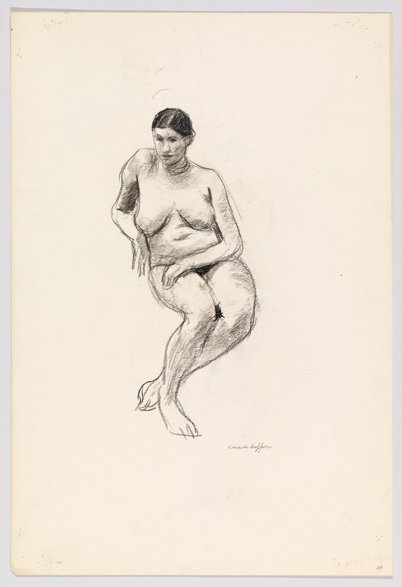 A charcoal sketch of a seated nude woman leaning forward with crossed legs.