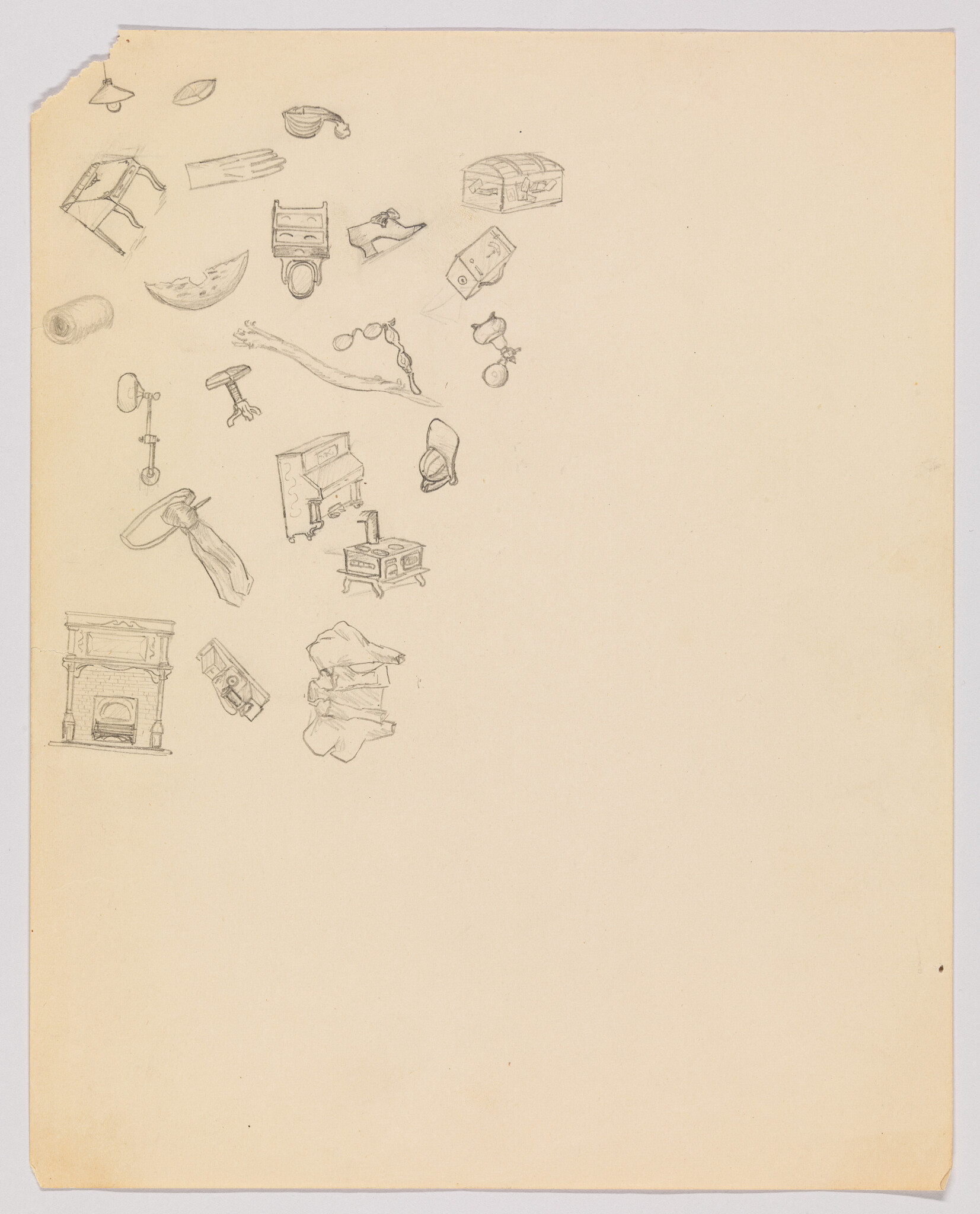 Sheet of paper with small pencil sketches of various household objects clustered in the upper left.