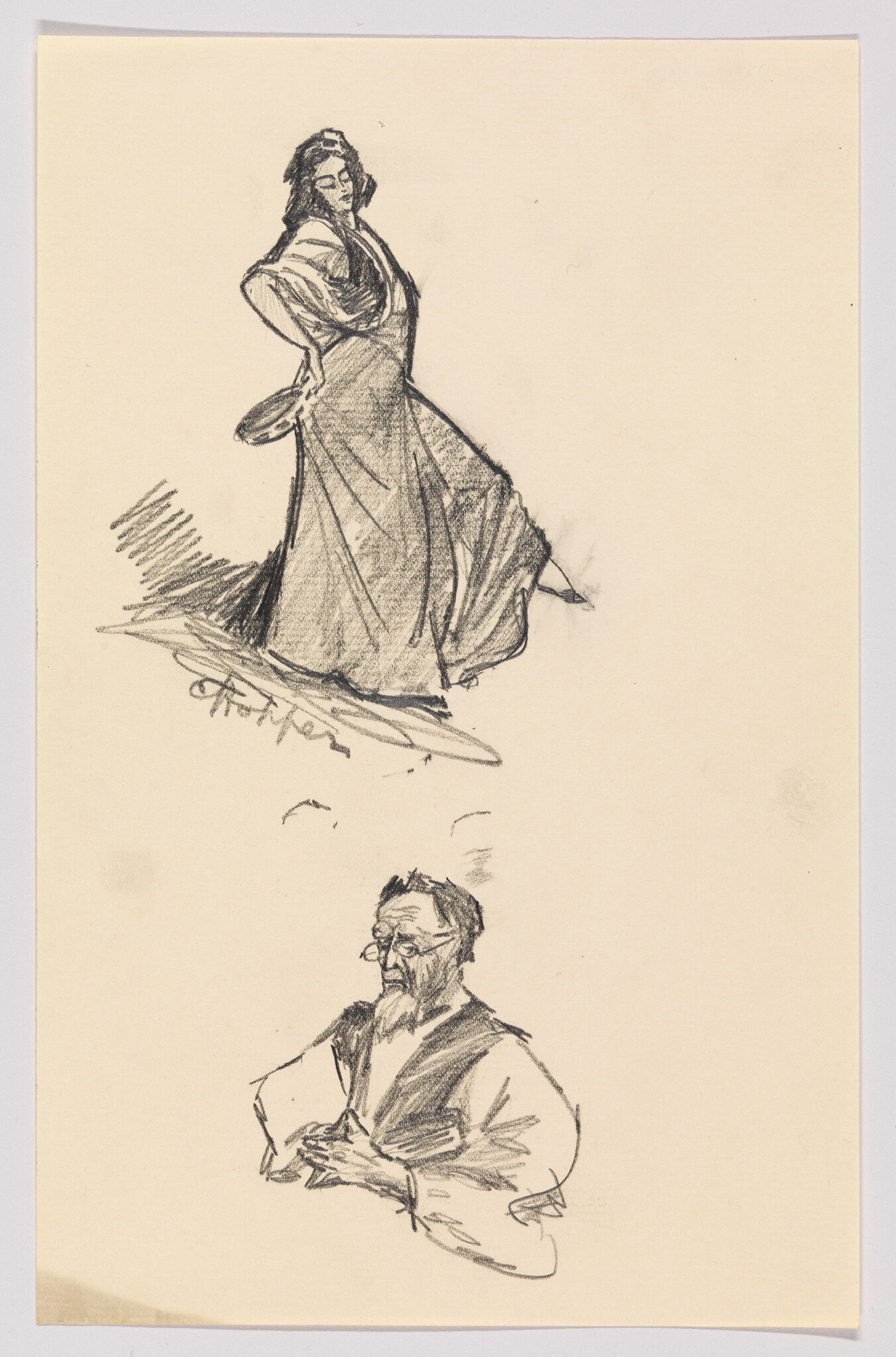 A graceful woman in a long dress poses above a seated bearded man with clasped hands.