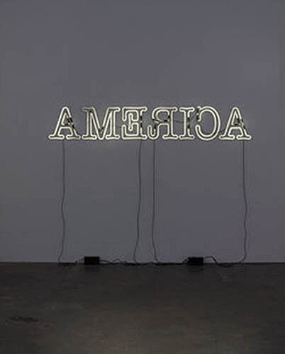 america written in neon lights in odd formation