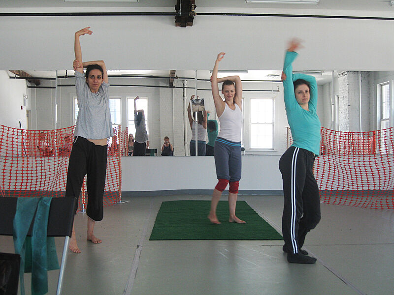 Three dancers from Deganit Shemy and Company practice a routine.