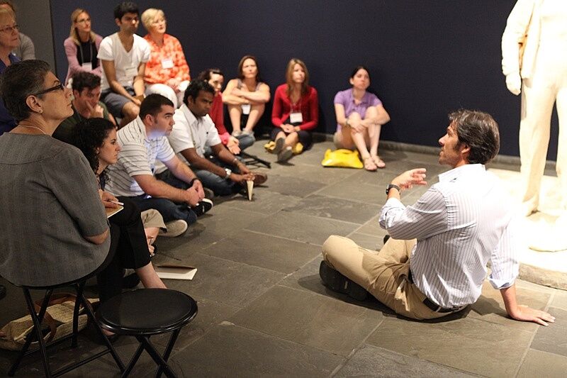 Teachers listen to a Whitney Museum staff member.