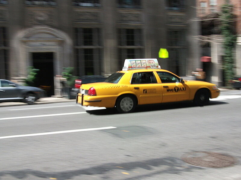 A taxi driving through New York