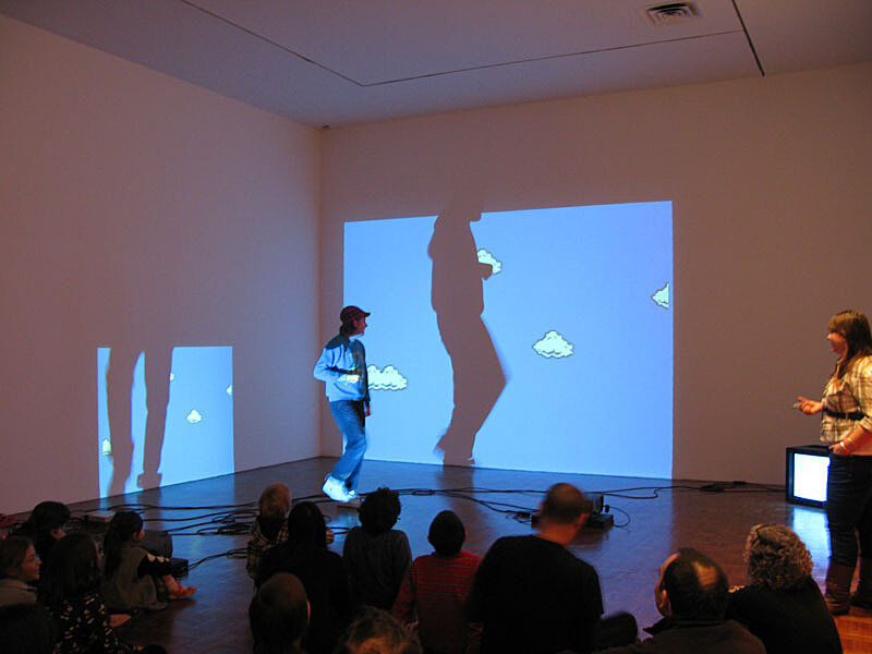 The artist shows his work to an audience