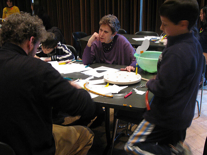 People collaborate at the workshop