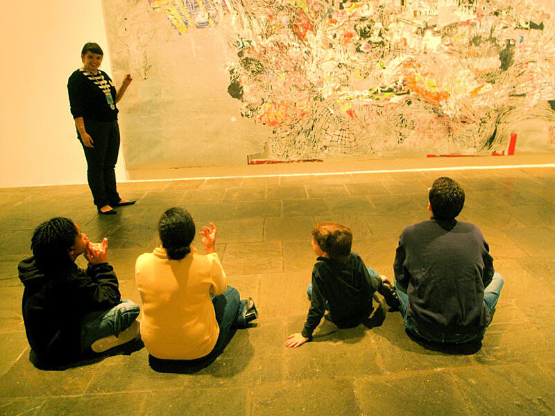 A family sitting in the gallery