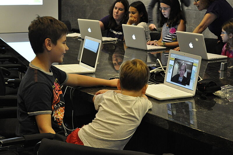 Children participate in a live chat with Cory Arcangel