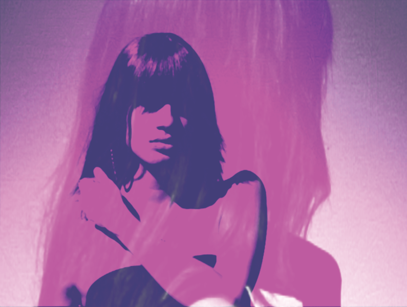 A video still of a women with a purple tint.