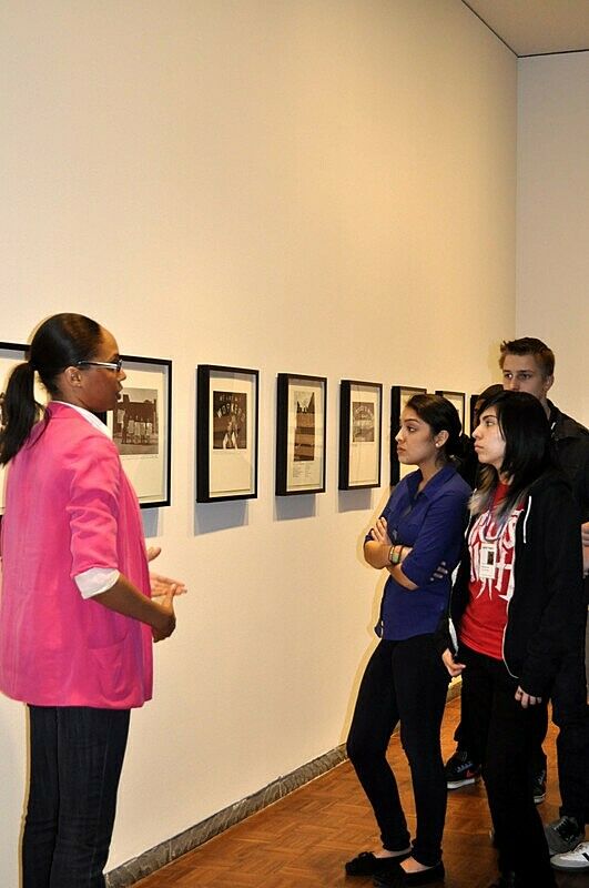 students looking at photos