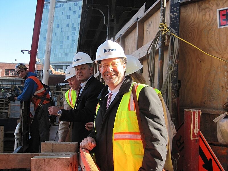 Museum Director Adam Weinberg poses outside at the new building site.