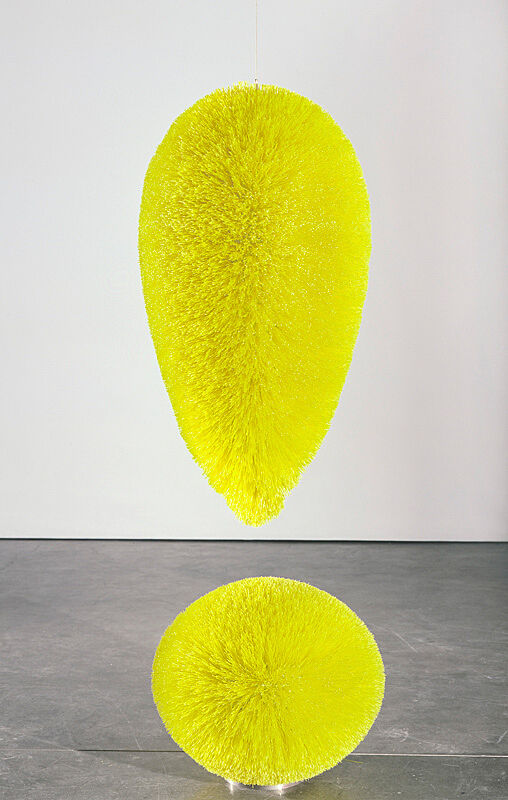 A sculpture by Richard Artschwager. A giant neon yellow exclamation point.