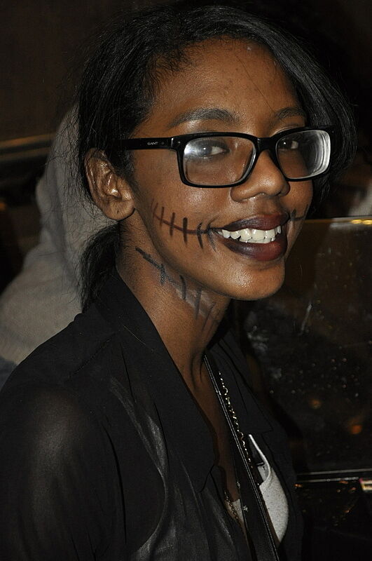 Youth Insights participant Stephanie shows off her skull-tastic face paint