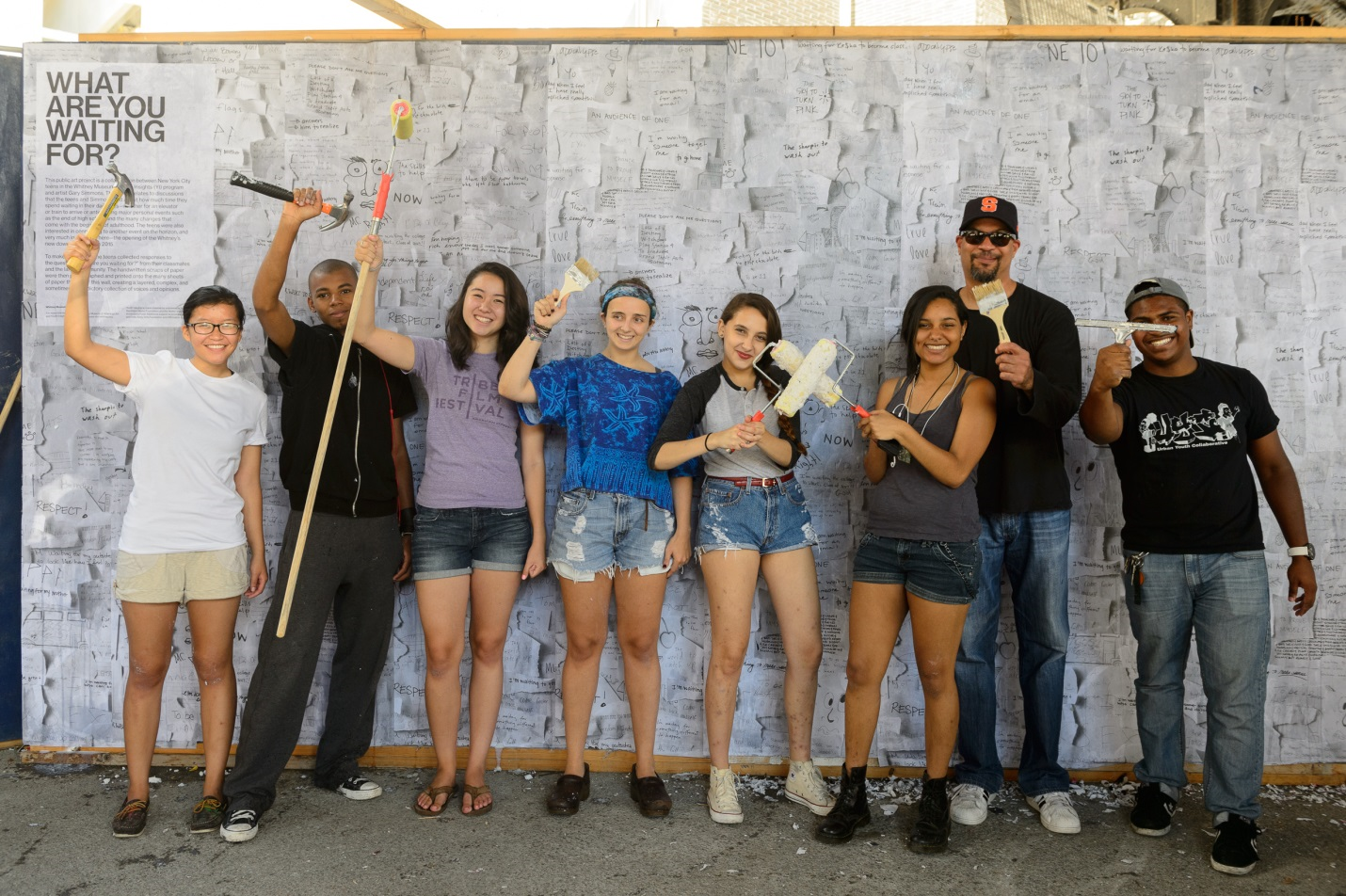 Students posing with their art project