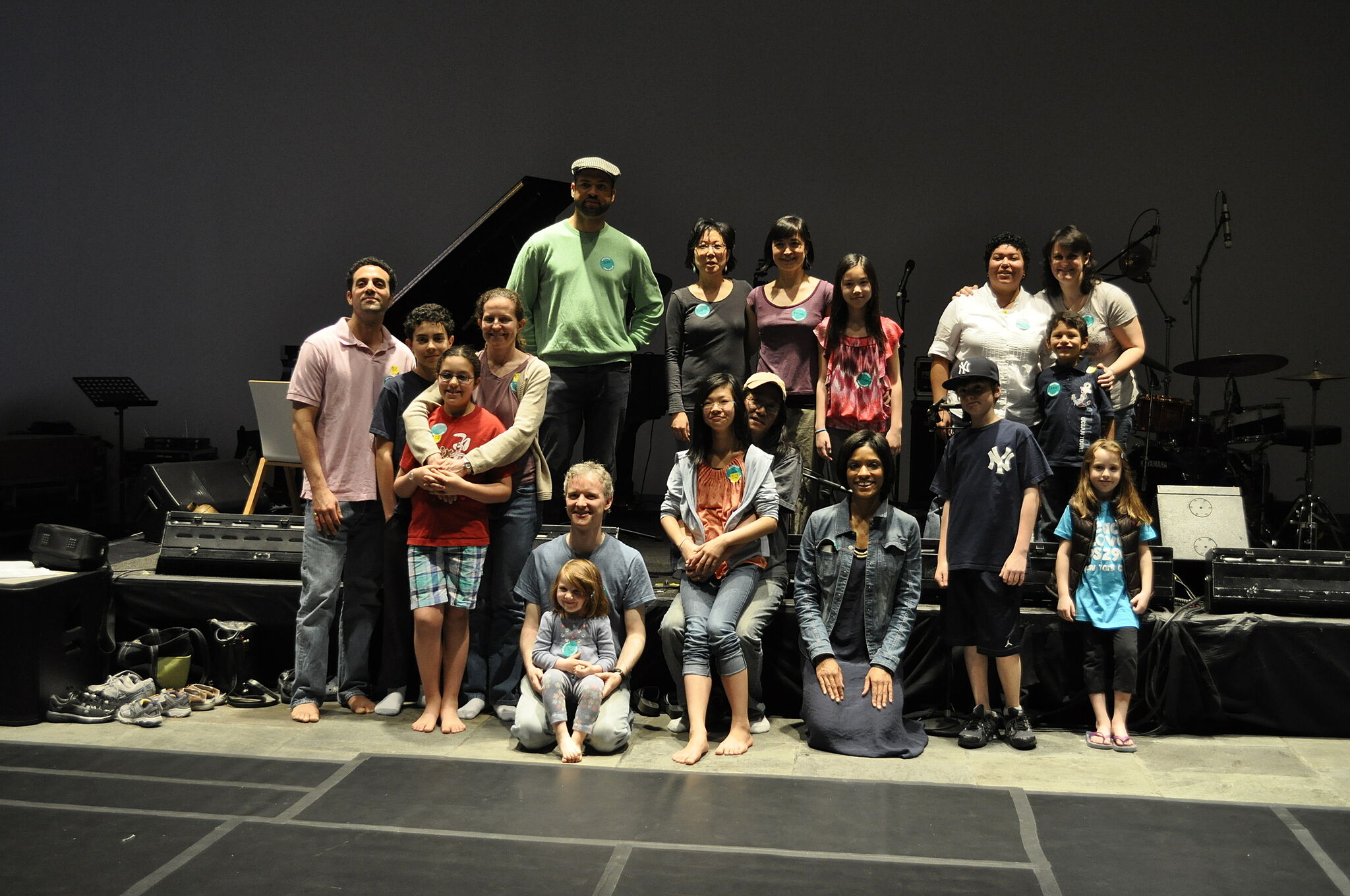 Group photo with artist and families