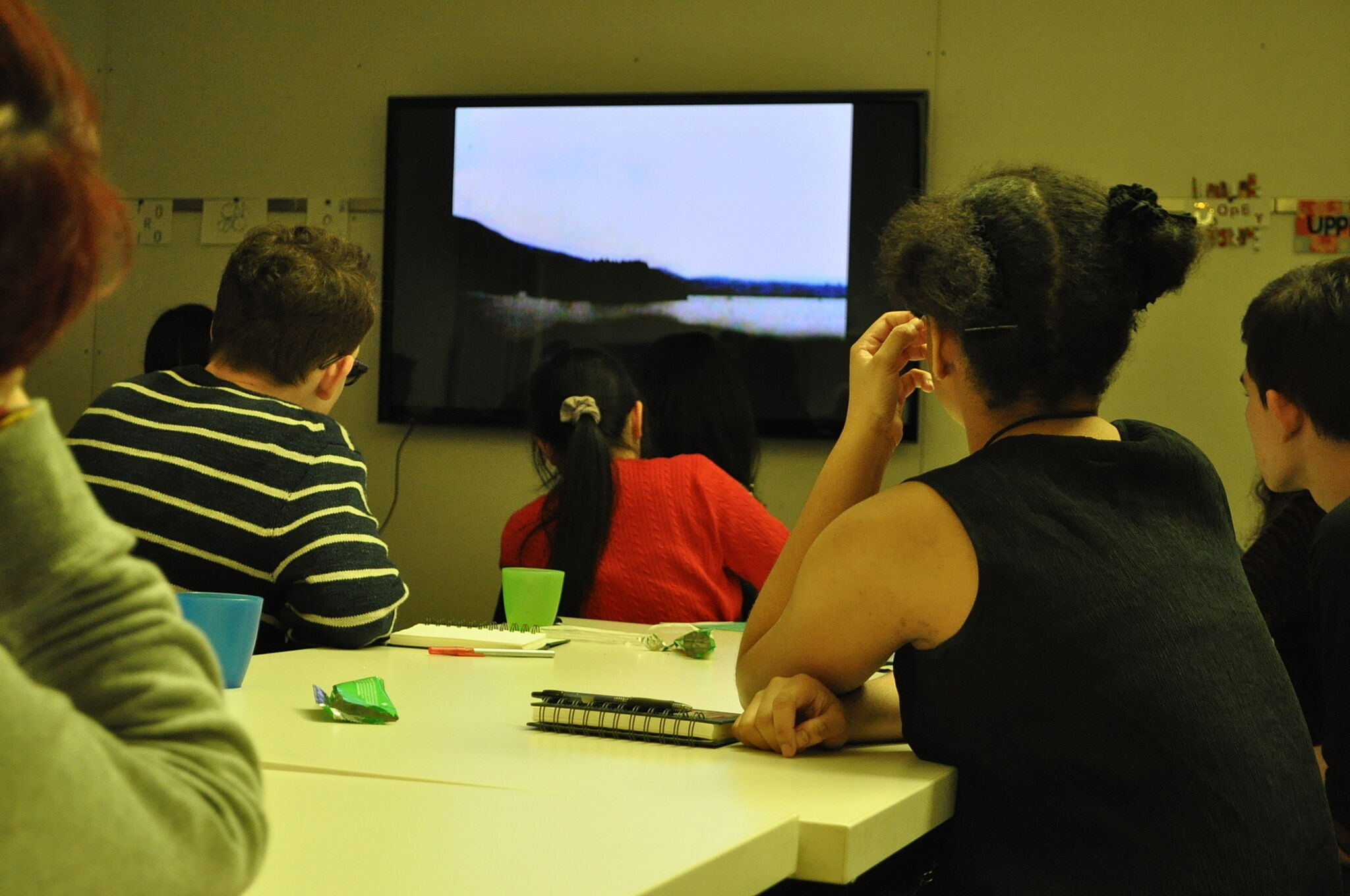 students watching a film in classroom