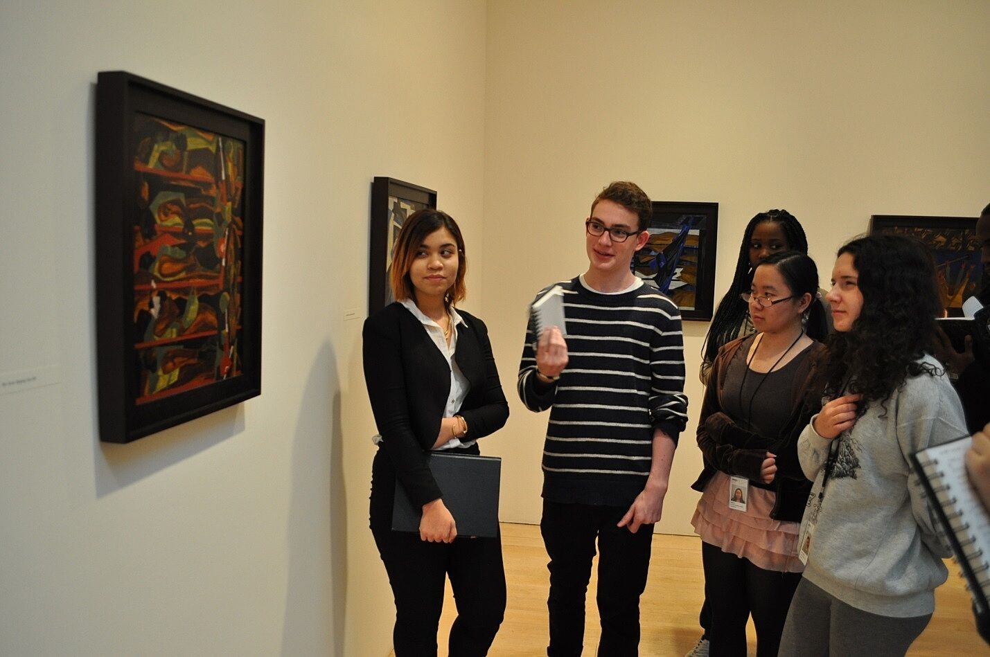 Students view artwork