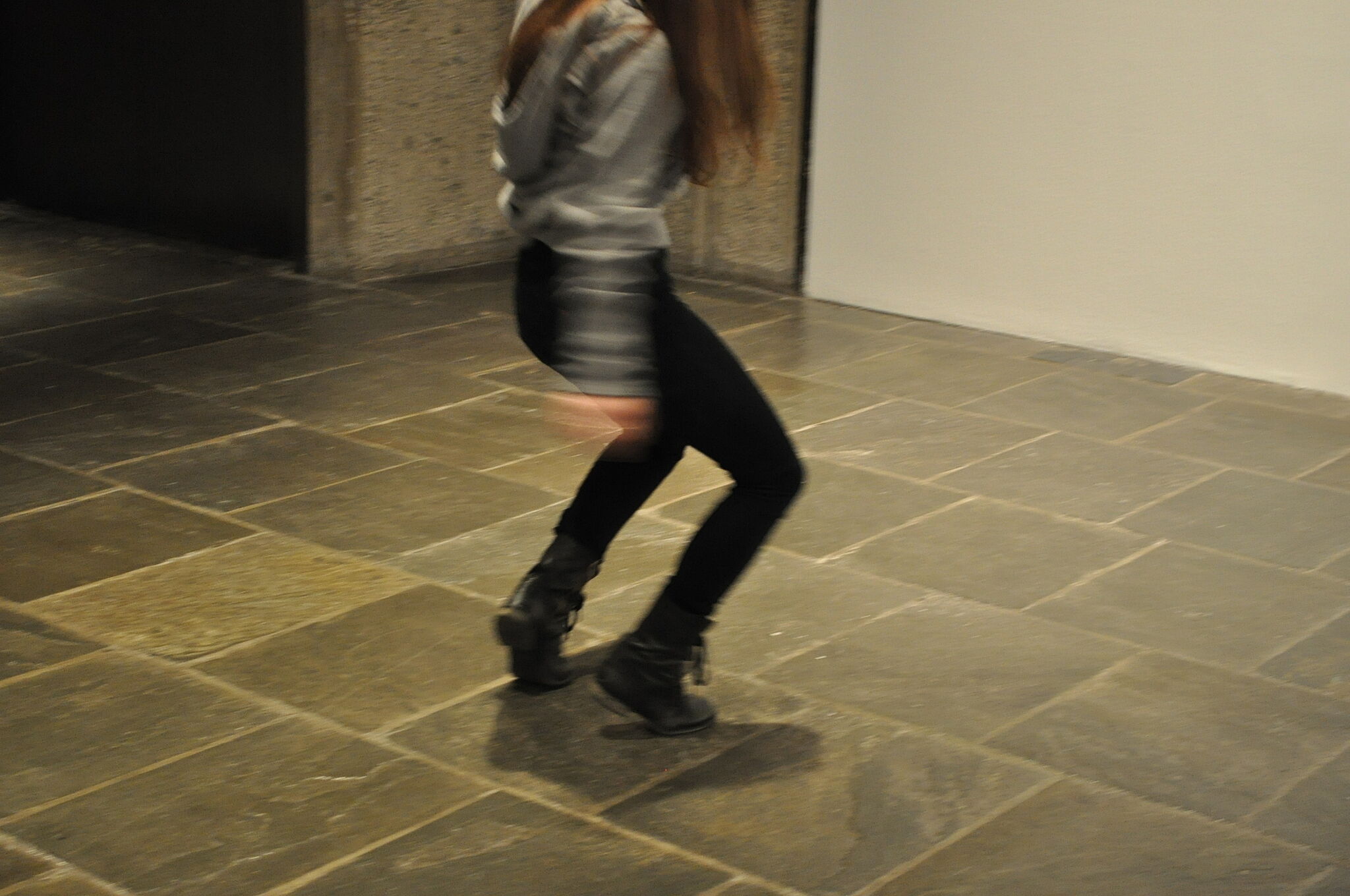 girl dances in gallery format