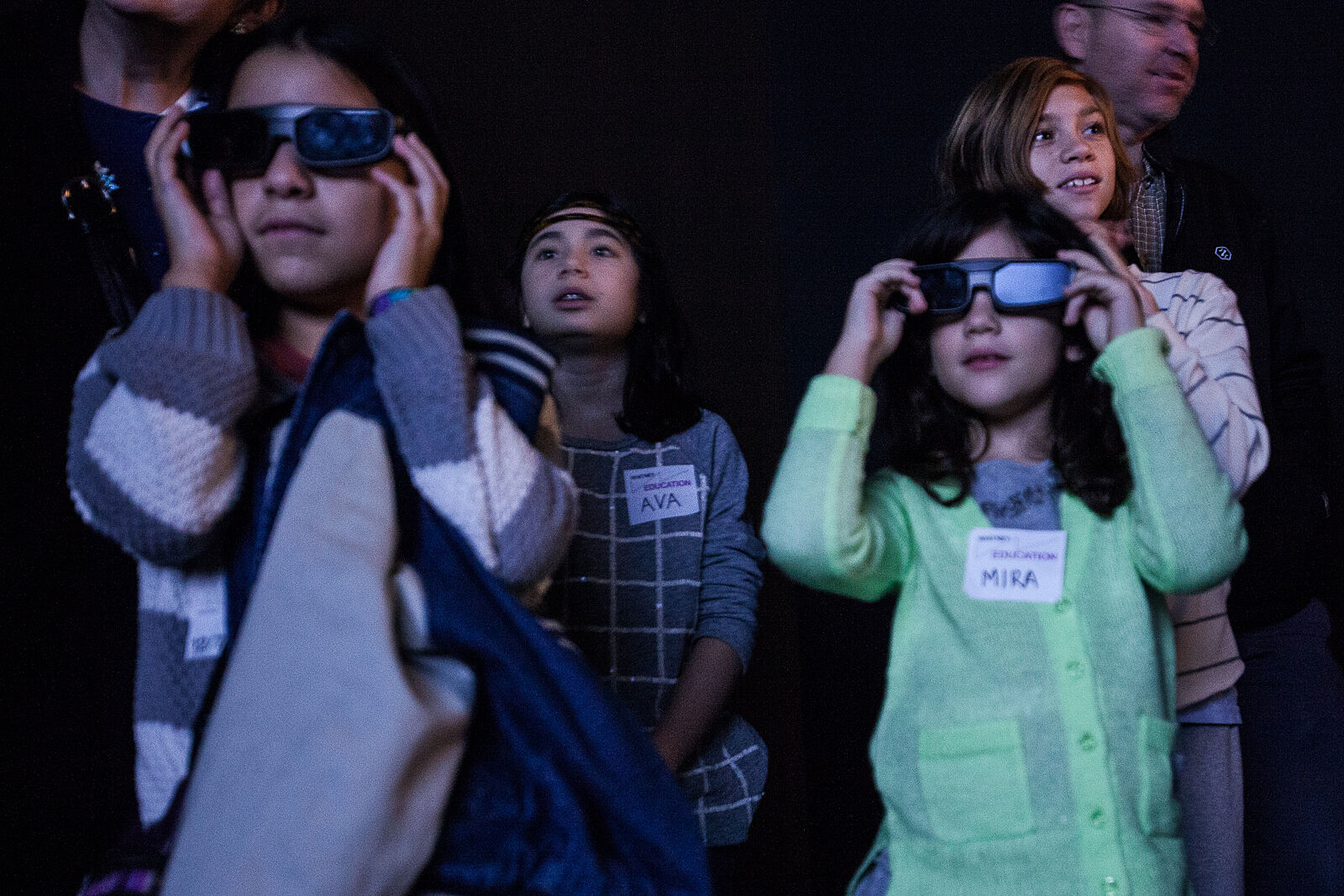 Kids use glasses to view an exhibit
