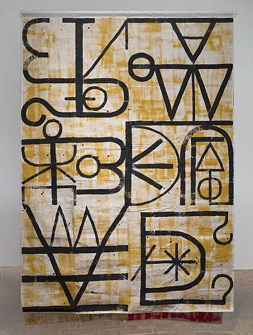 An artwork with black symbols.