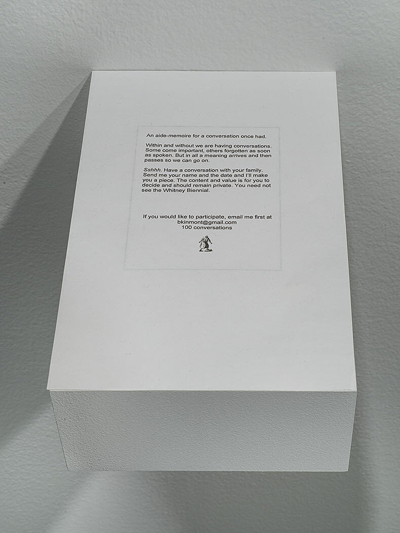Mixed media text printed in a gallery.