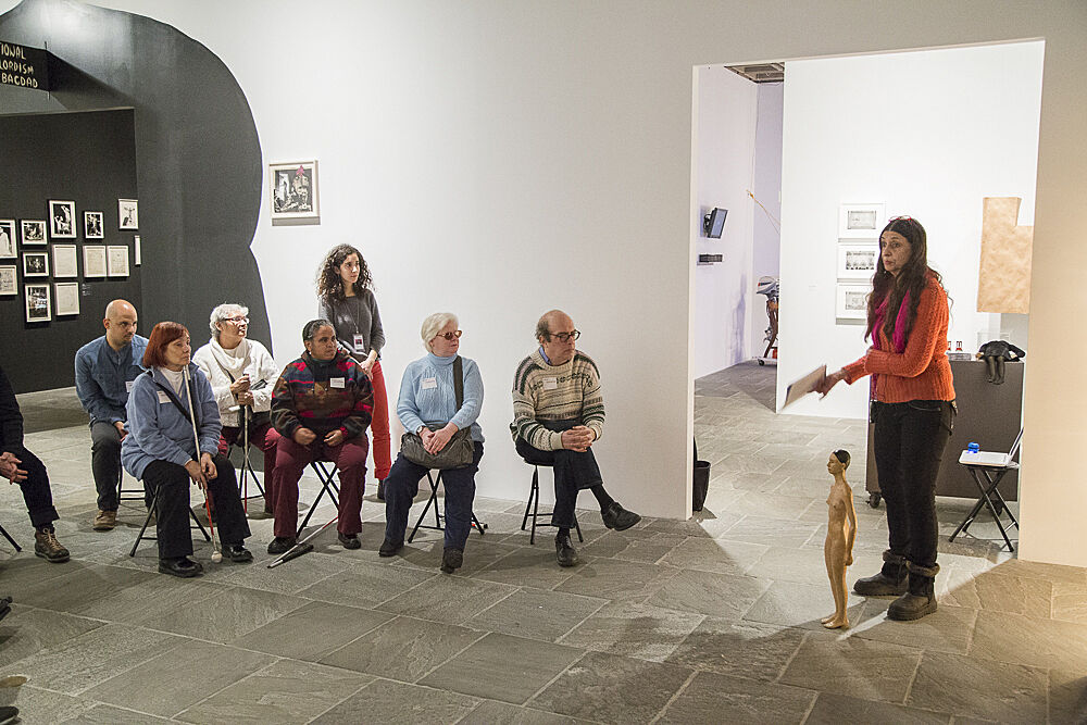 An artist talk with a group of blind and low vision visitors