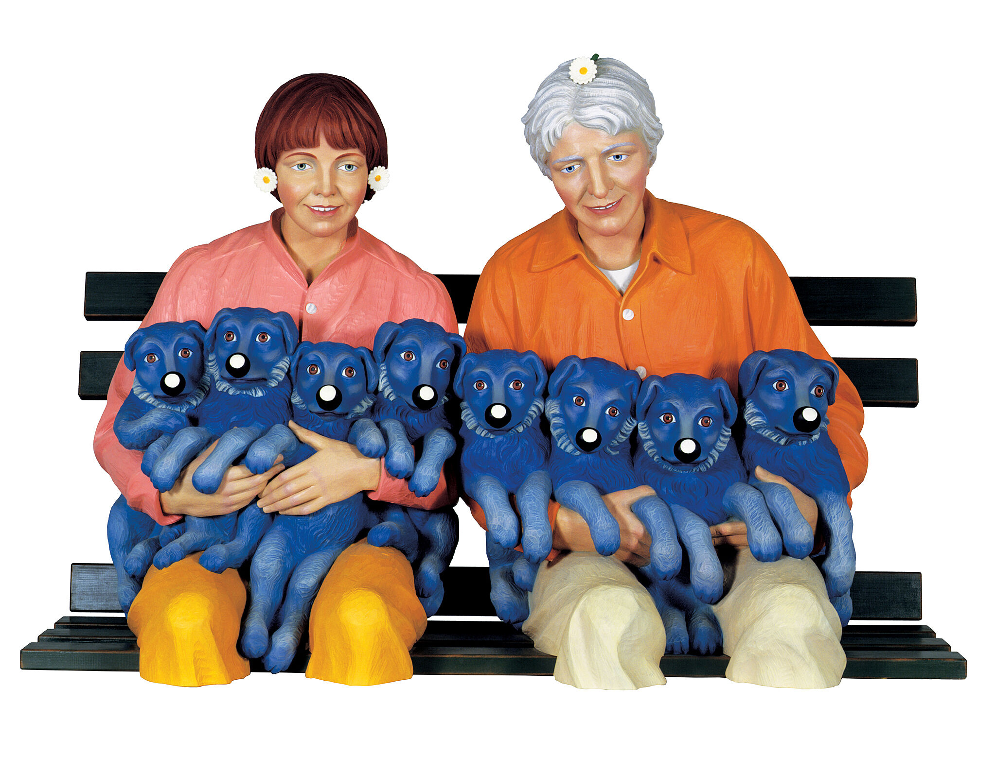 A sculpture of two people sitting on a bench holding 8 puppies.