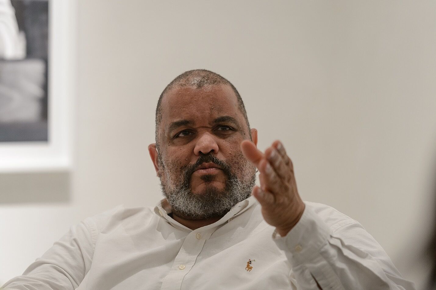 Dawoud Bey raises his hand to make a point.
