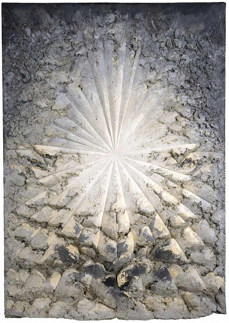 Gray layers of oil paint and sediment radiate in a starlike shape from a central white point that seems to emanate light in a monumental abstract artwork standing over 10½ feet tall.