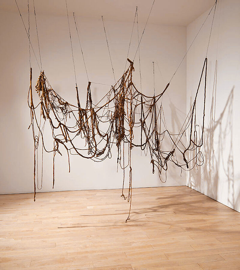A sculpture of rope hanging from the ceiling.