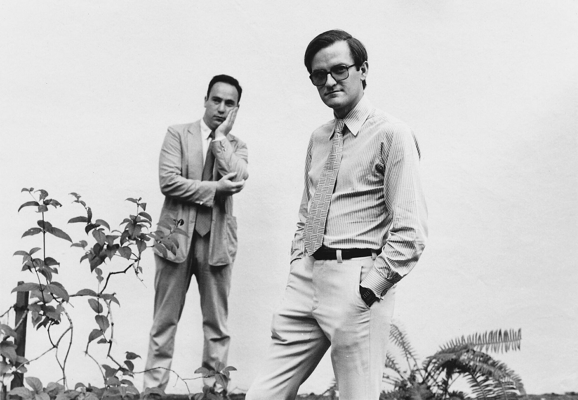 A black-and-white photograph of William Winant and David Rosenboom.