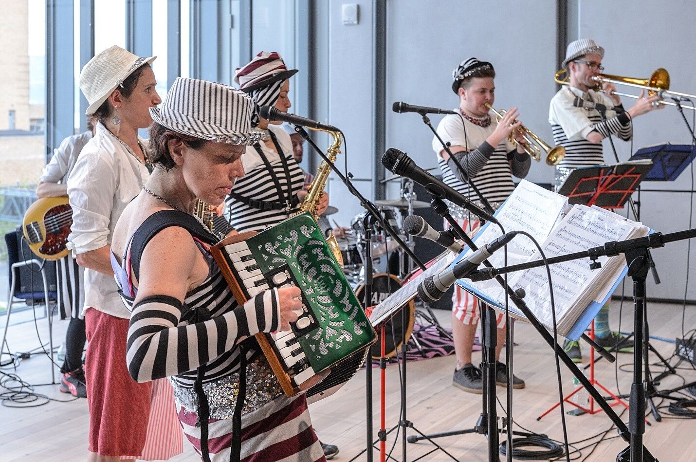 A band playing live in the Whitney Museum