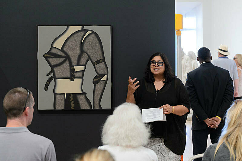 People gathered for a talk in the gallery.