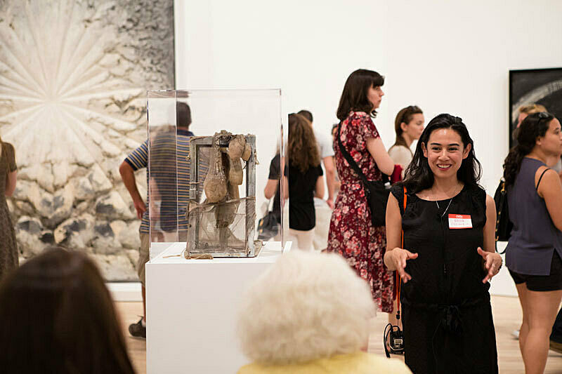 People gathered for a talk in the gallery.