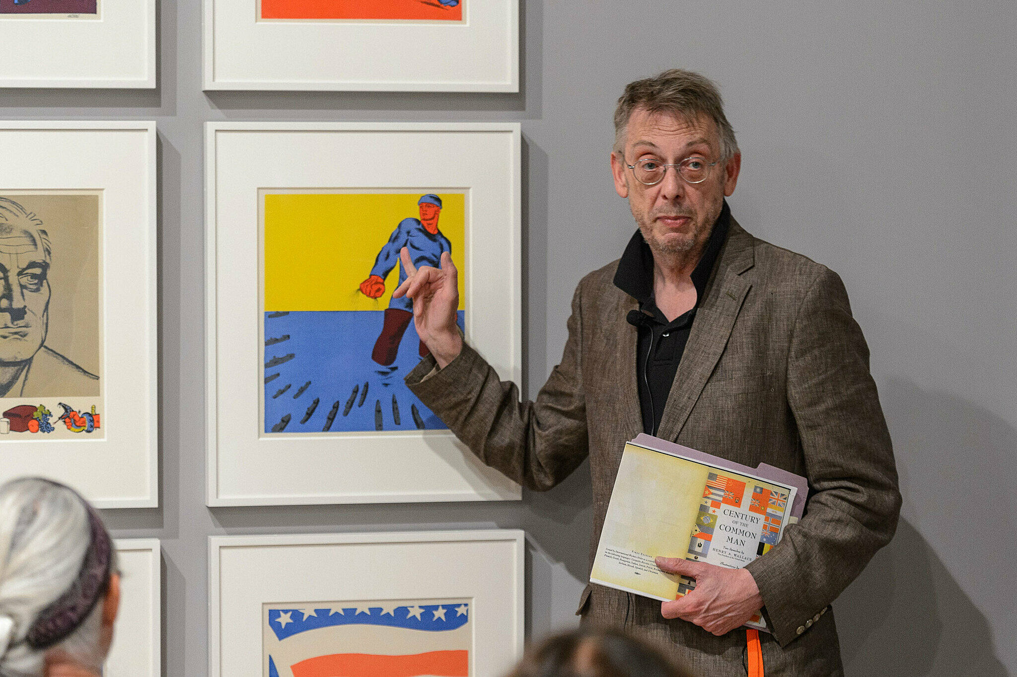 People gathered for a talk in the gallery.