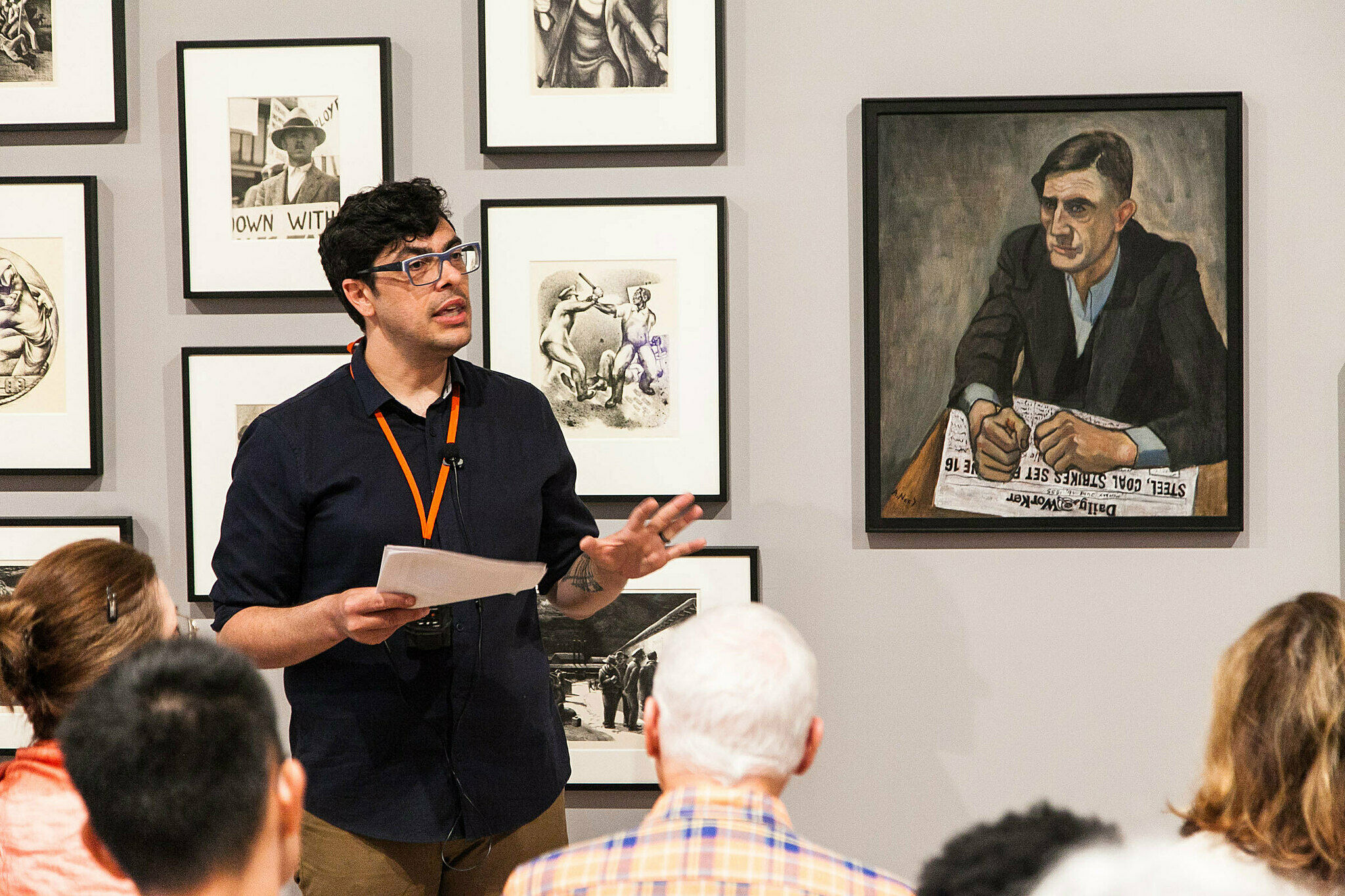People gathered for a talk in the gallery.