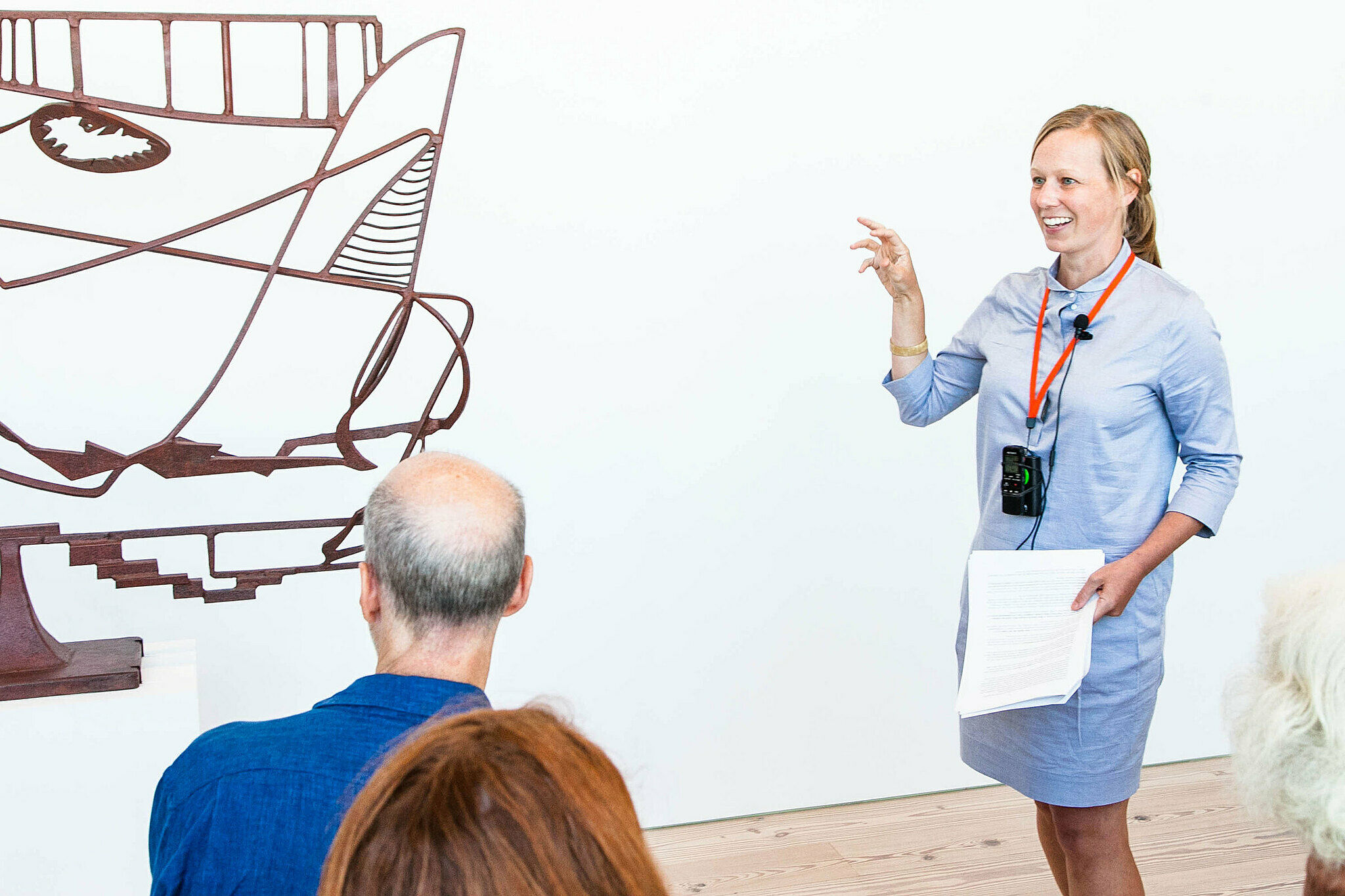 People gathered for a talk in the gallery.