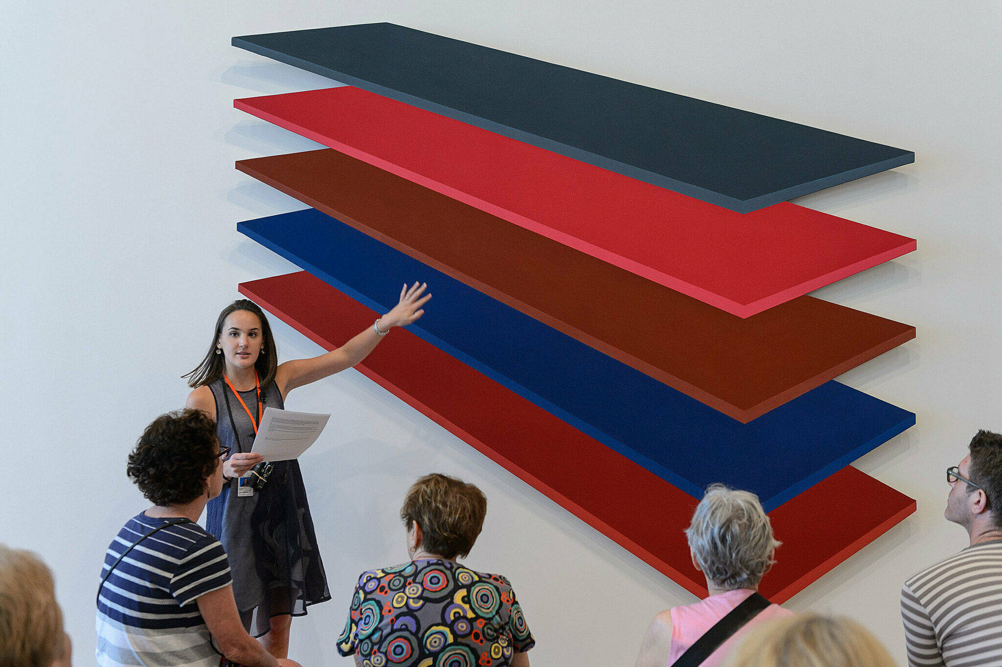 People gathered for a talk in the gallery.
