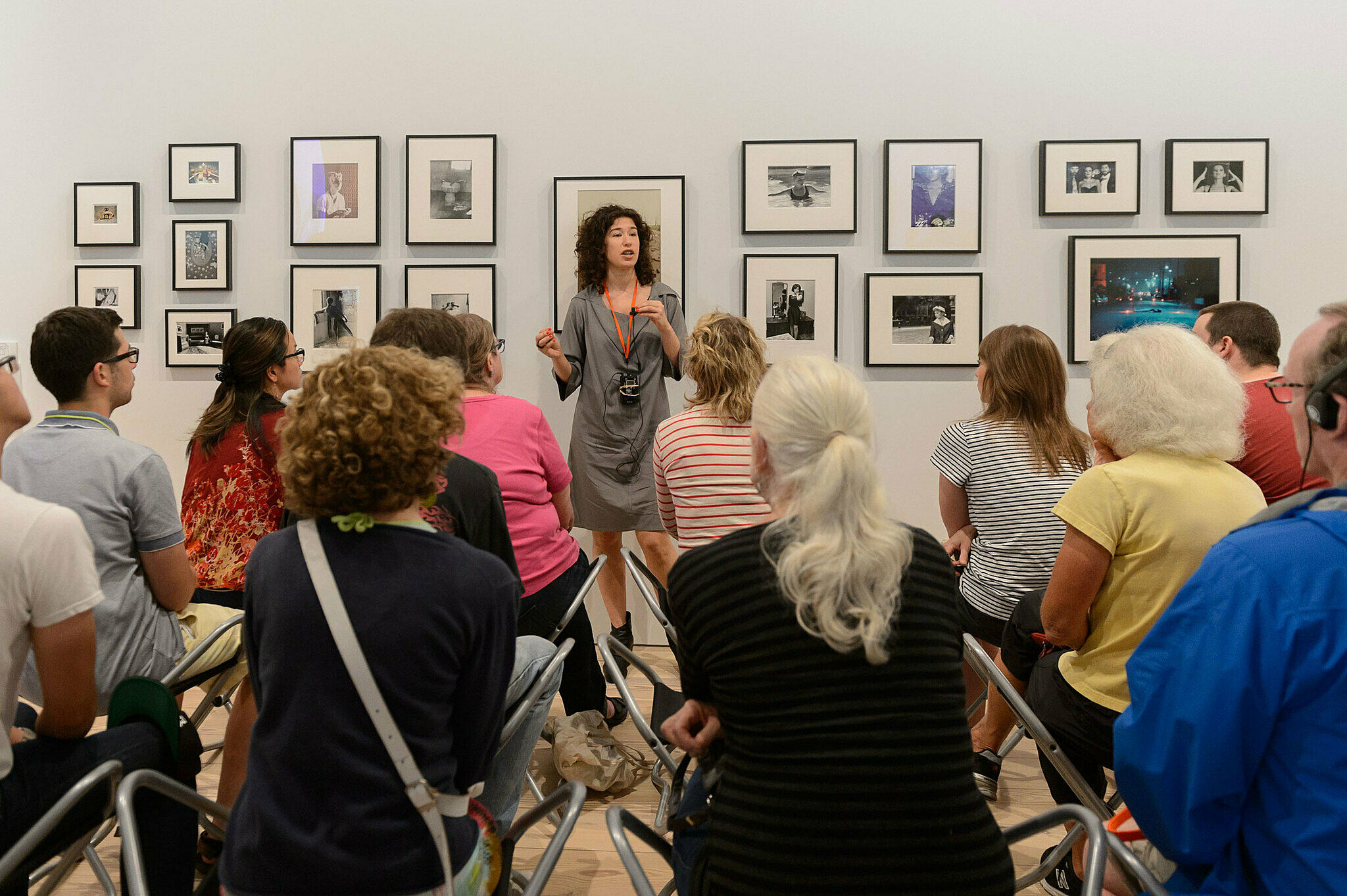 People gathered for a talk in the gallery.