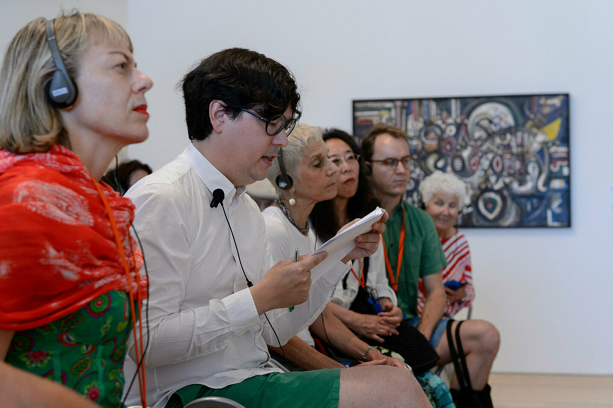 People gathered for a talk in the gallery.