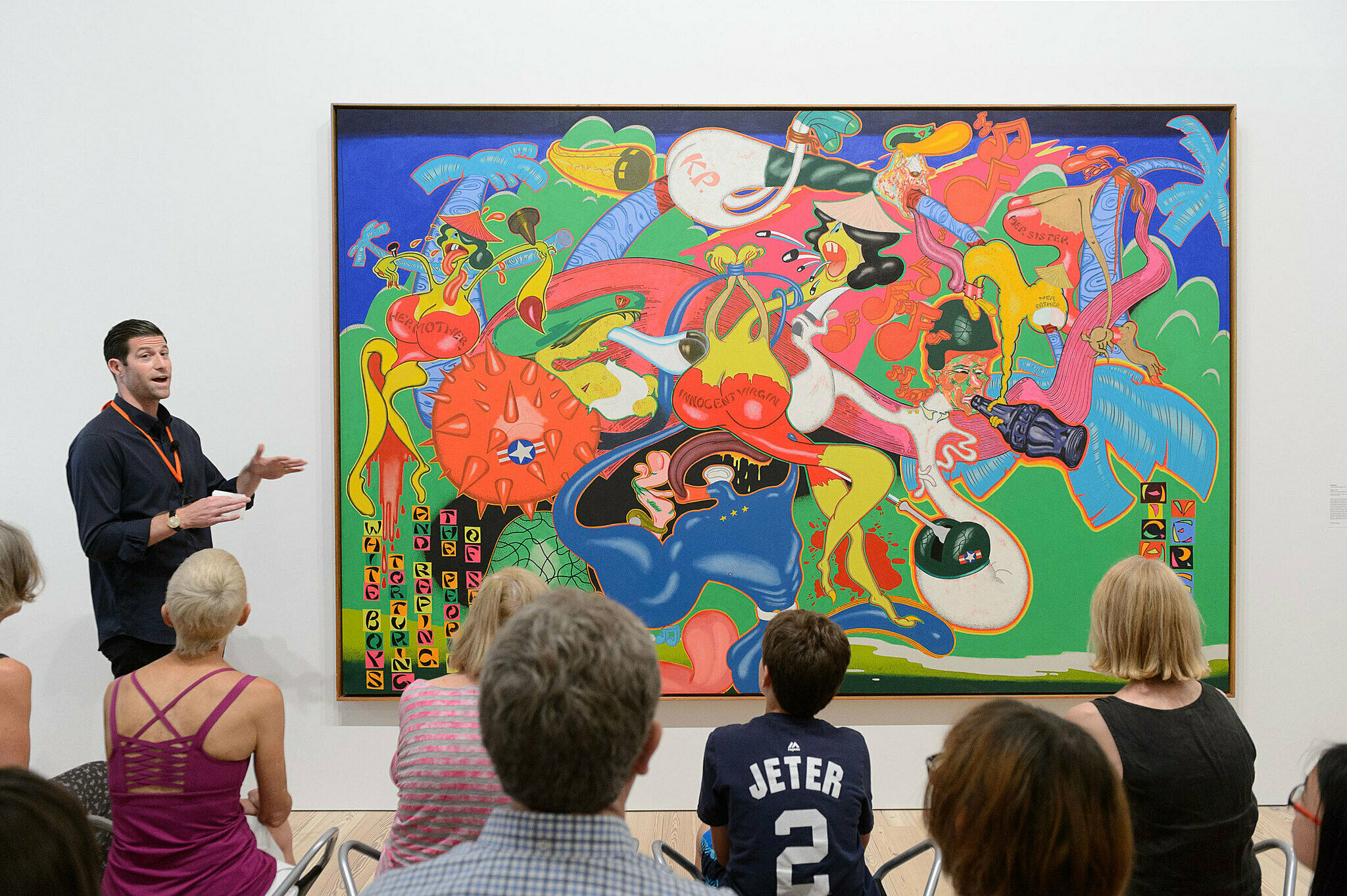 People gathered for a talk in the gallery.