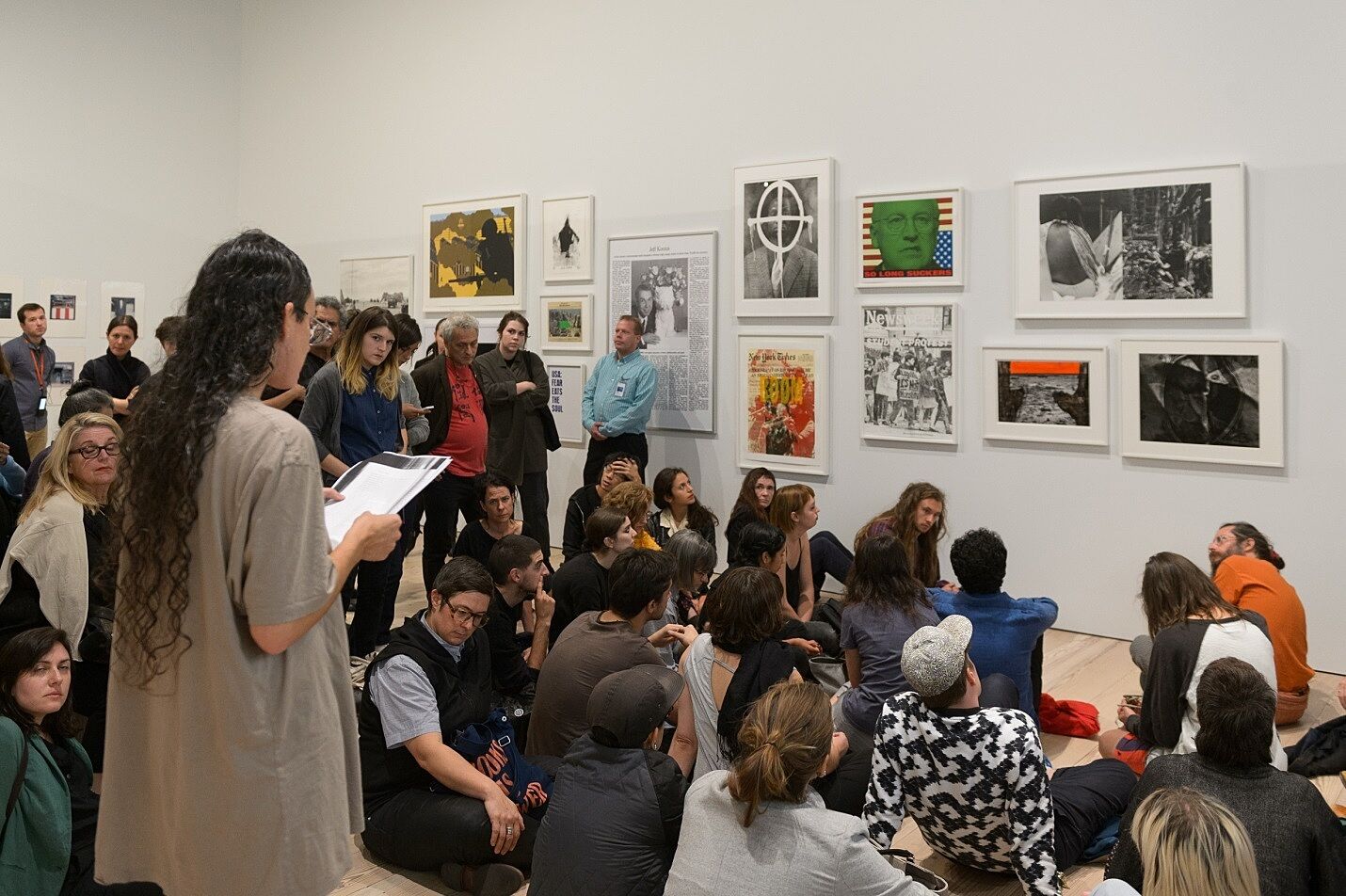 A public reading in an art gallery
