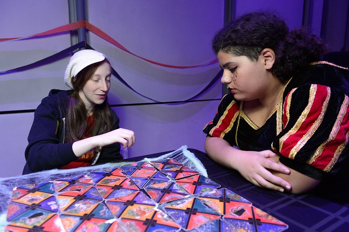 Teen gets tarot-card reading.