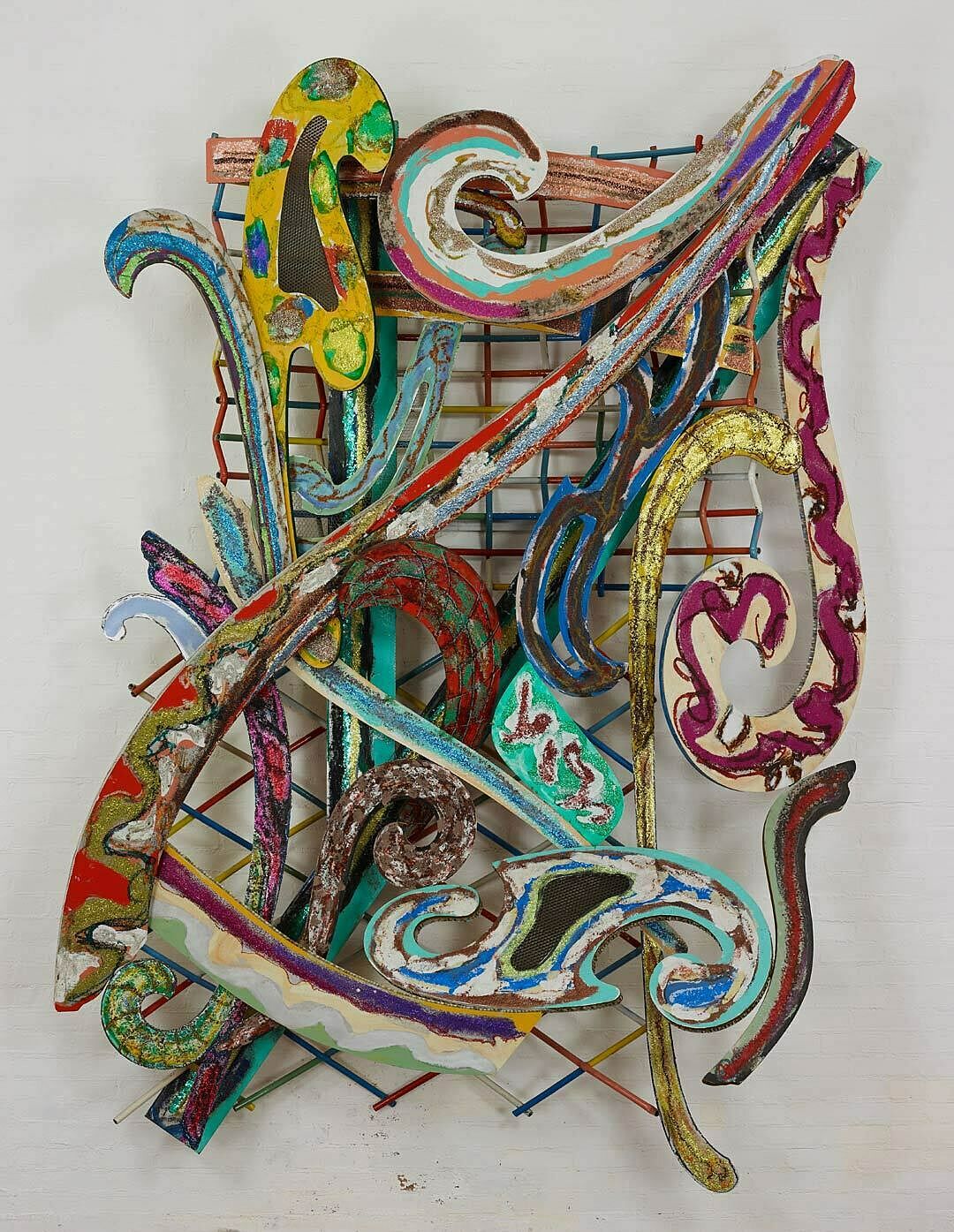 A mixed media artwork of curvy swirls overlapping.