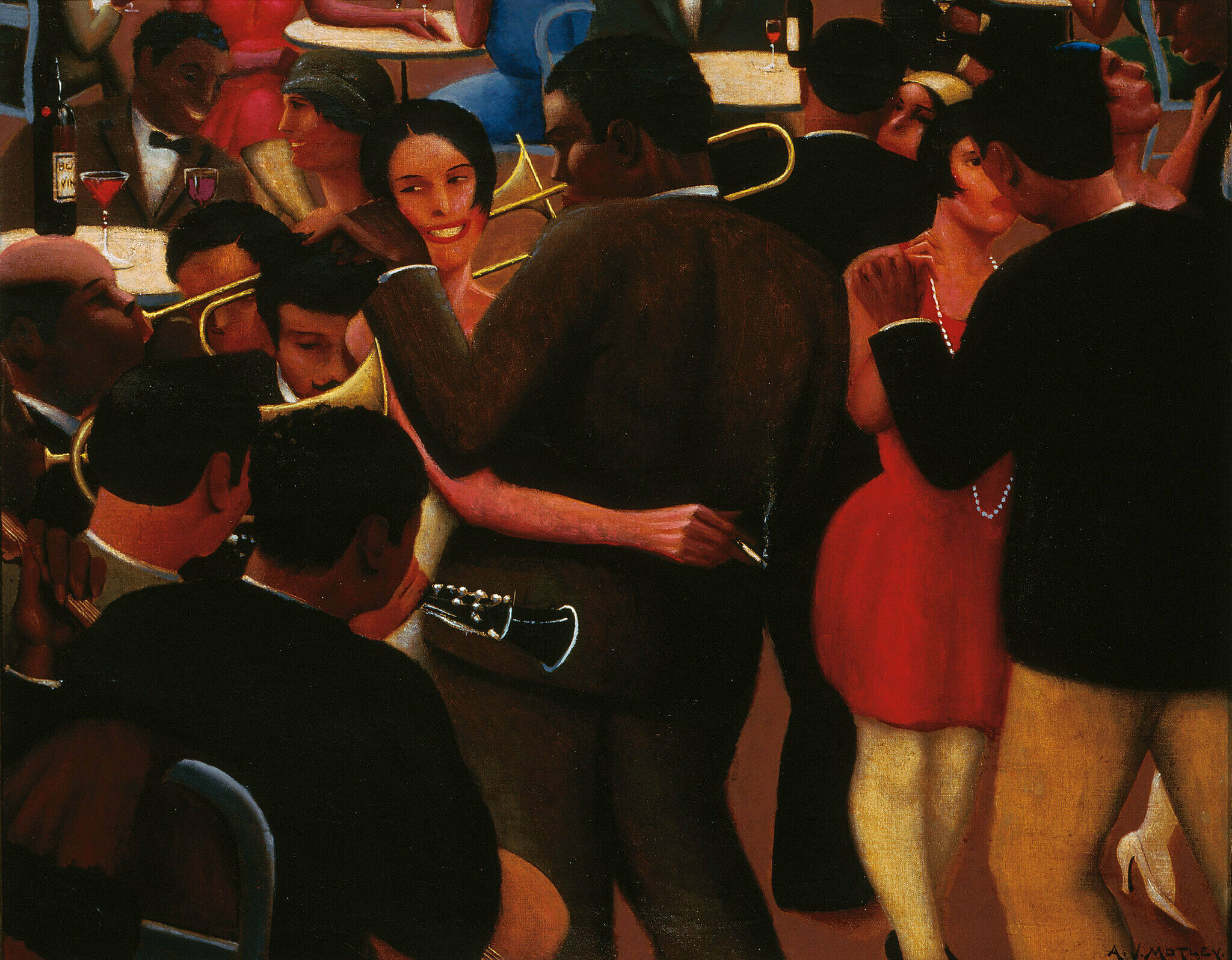 A jazz band plays a concert while people dance.