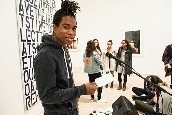 A reading by a student in a gallery
