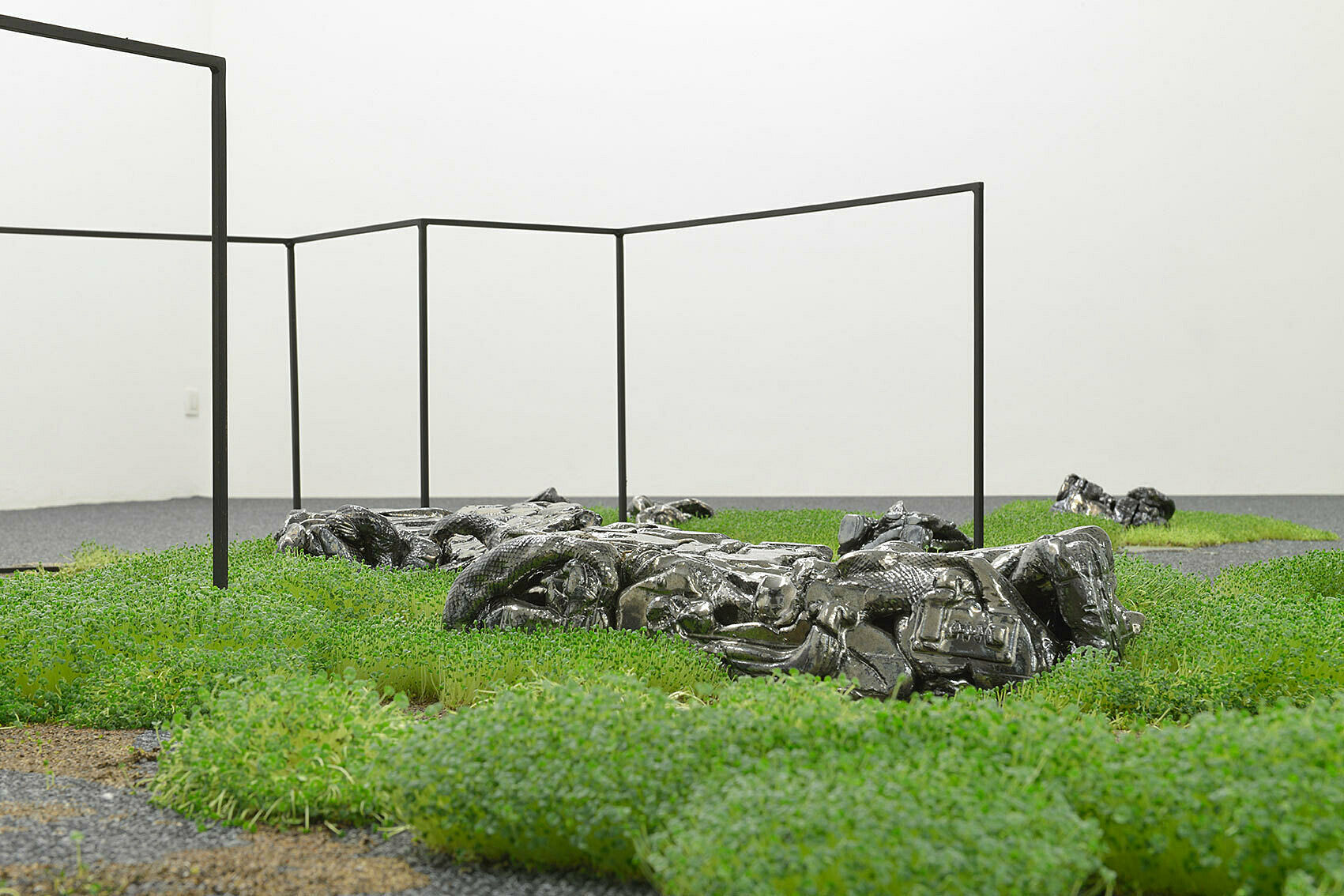 A sculpture by Rochelle Goldberg including chia grass installed in the galleries