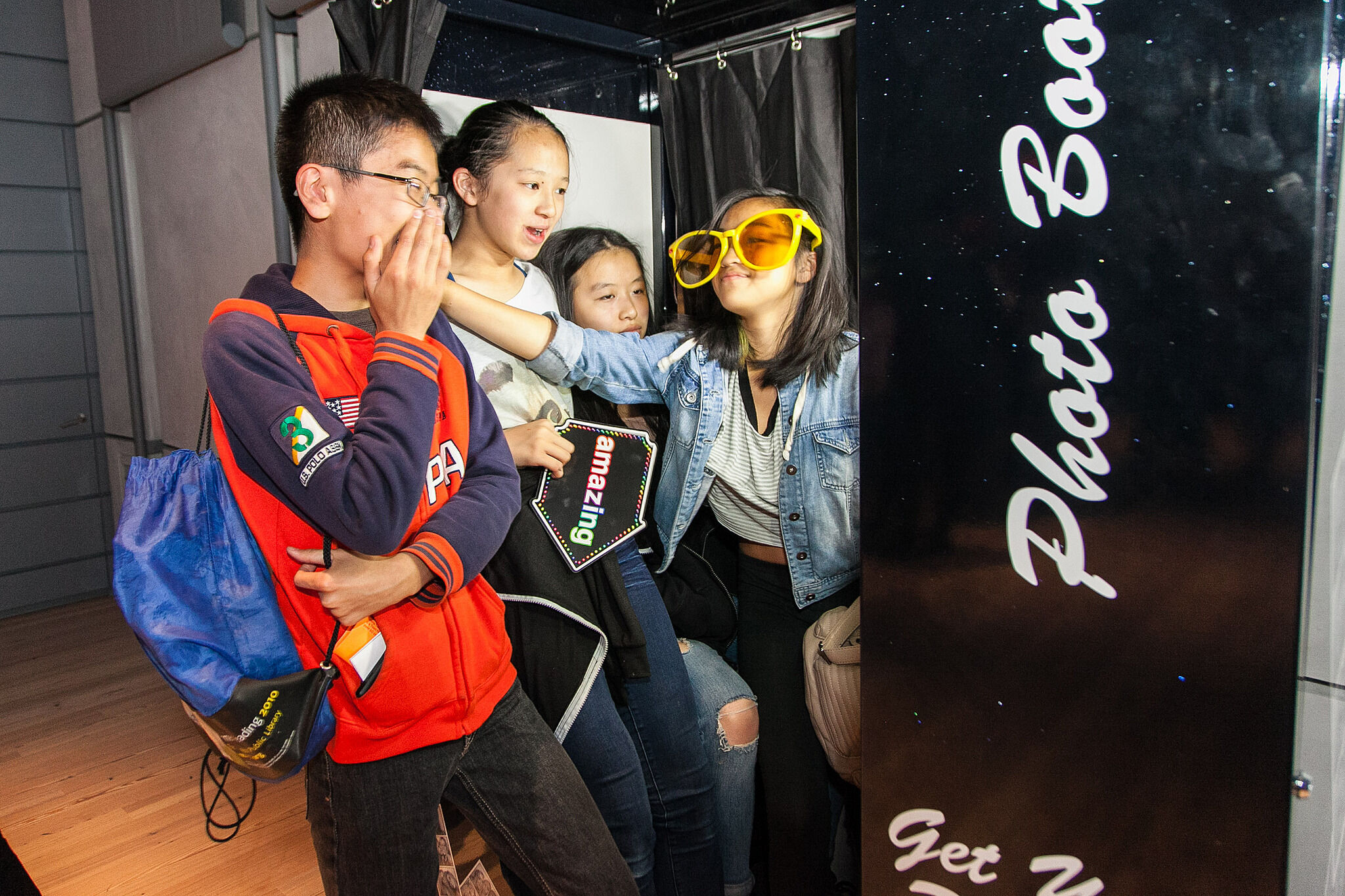 Students have a fun time in a photo booth
